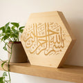 Hexagonal calligraphy block detail on dark background